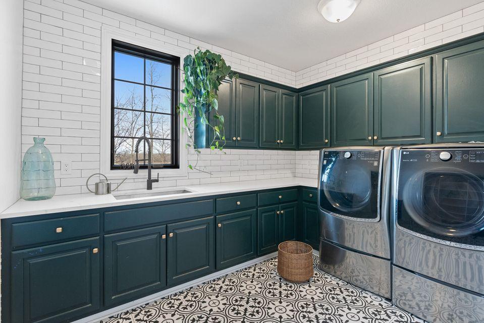 Interior view of the laundry room in the  Montana Custom home designed and build by Mikkelson Builders